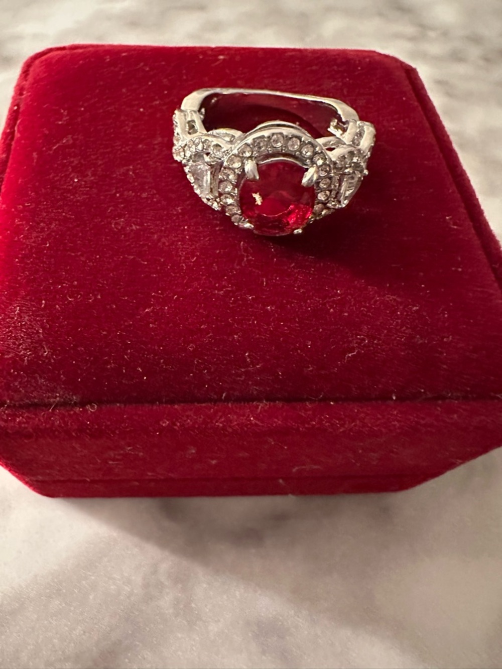Women’s Silver Ring with Red Gemstone and Clear Accents